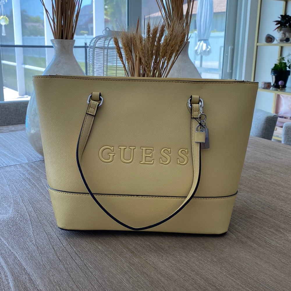 Brand new Yellow Guess purse
